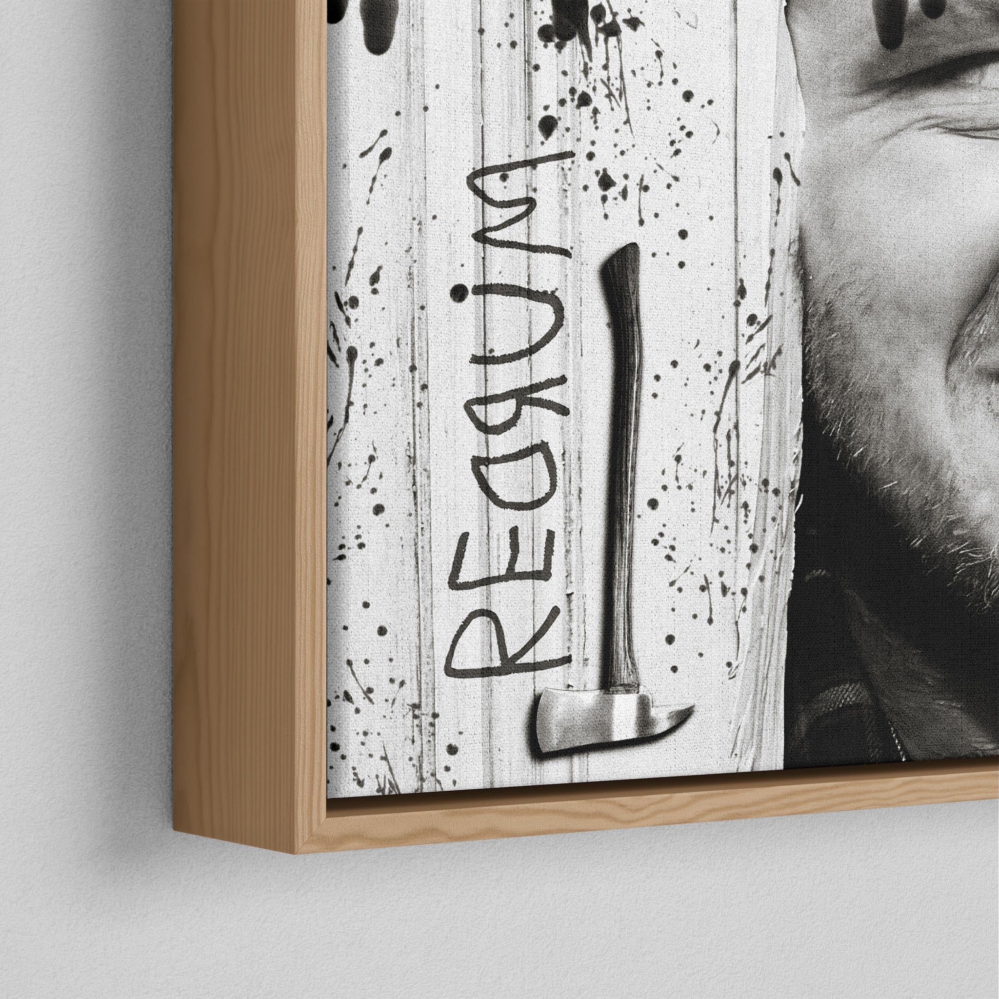 Corner close-up of the natural oak floating frame on the Shining Here's Johnny black and white canvas