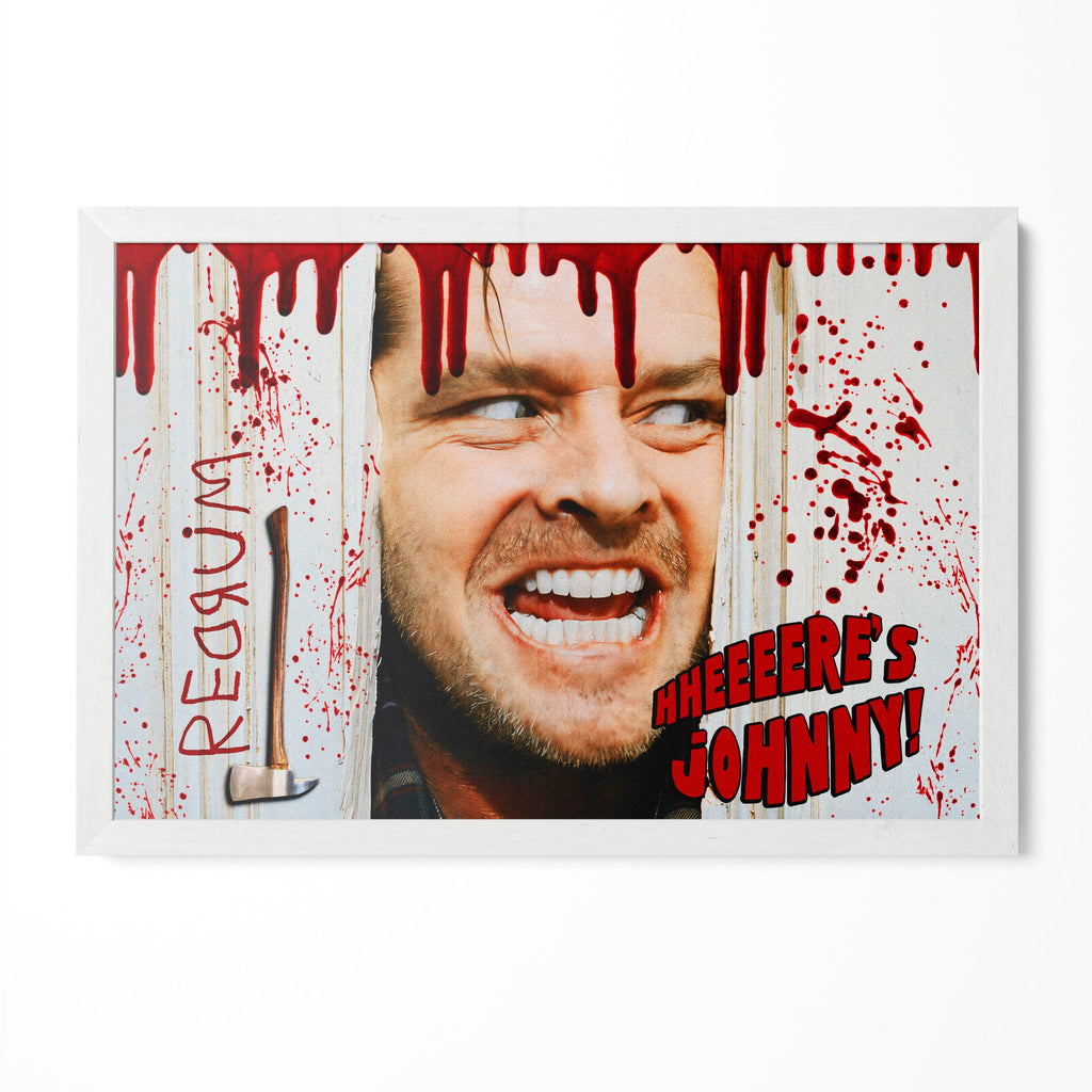 The Shining Here's Johnny axe scene poster with Jack Torrance and blood splatter in a classic white poster frame