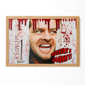 The Shining Here's Johnny axe scene poster with Jack Torrance and blood splatter in a natural oak poster frame