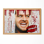 The Shining Here's Johnny axe scene poster with Jack Torrance and blood splatter in a natural oak poster frame