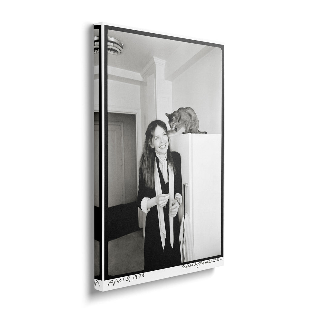 Gallery-wrapped black and white canvas of Diane Keaton with her cat displayed on a wall