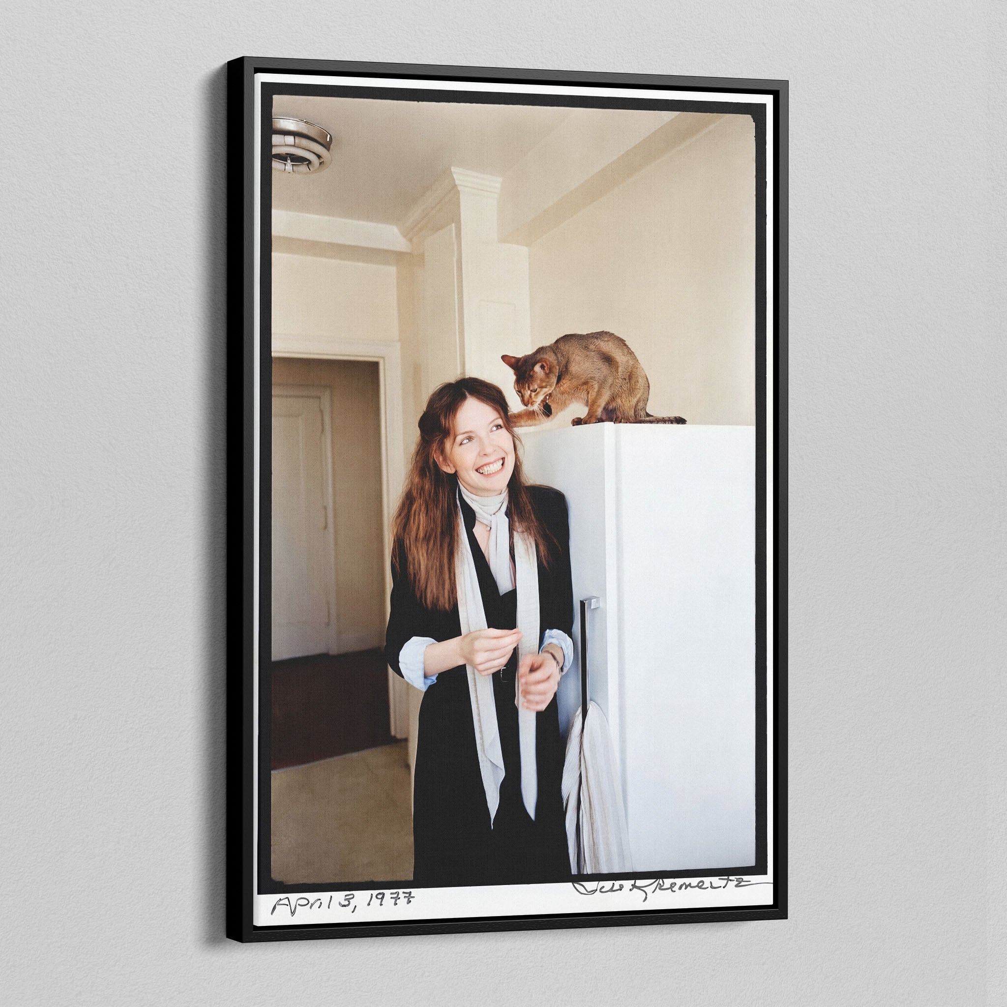 Angled view of the Diane Keaton colour canvas in a black floating frame