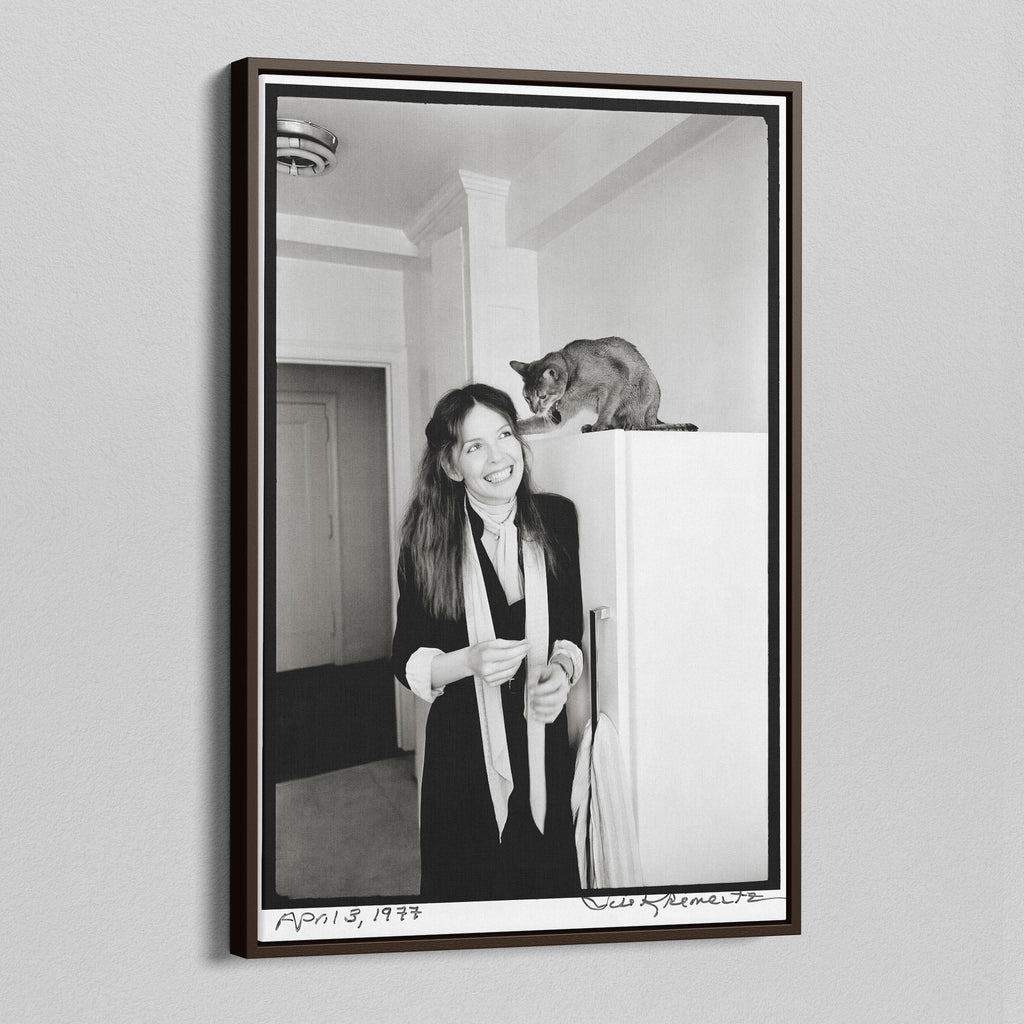 Angled view of the Diane Keaton black and white canvas in a dark walnut floating frame