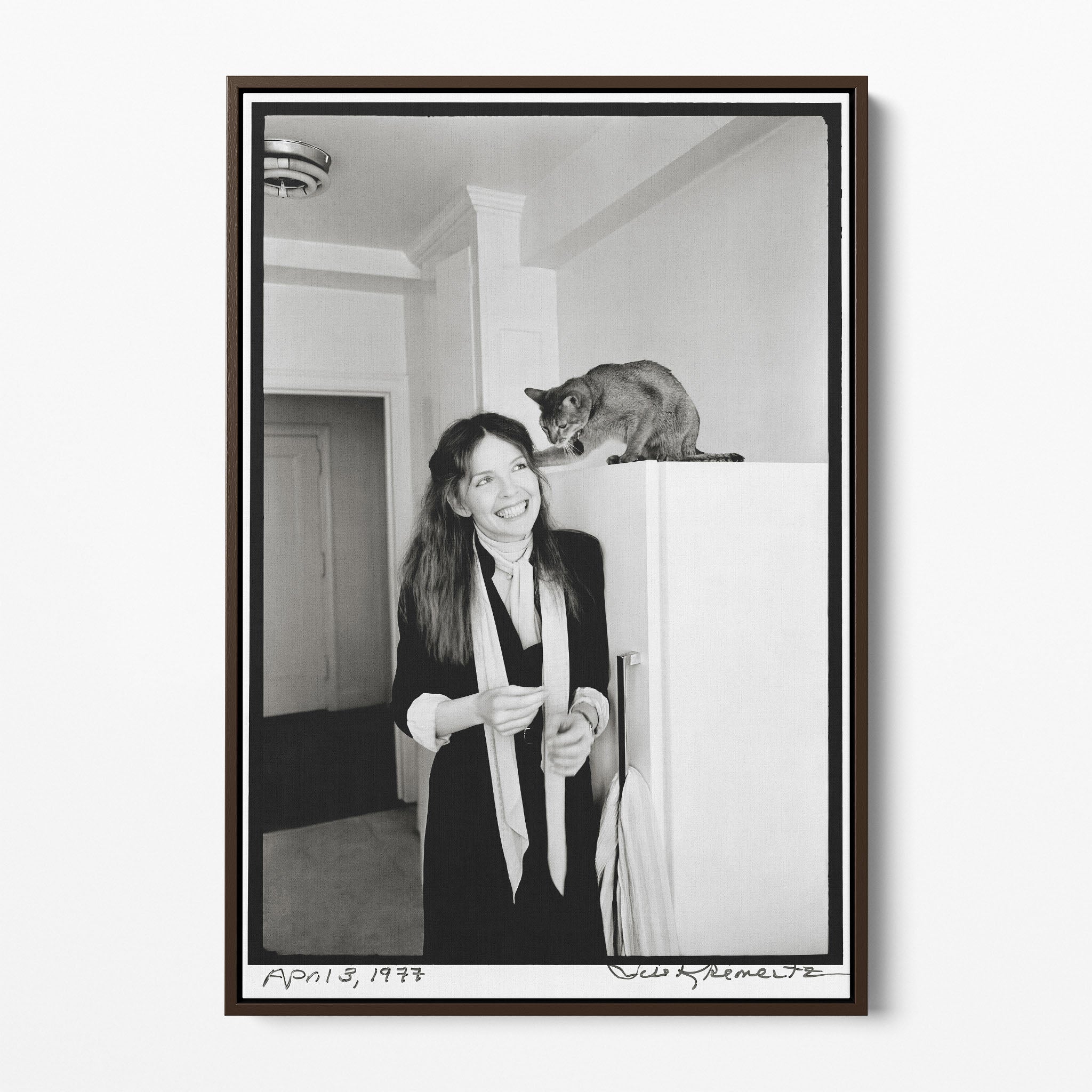 Front display of the Diane Keaton black and white canvas in a dark walnut floating frame