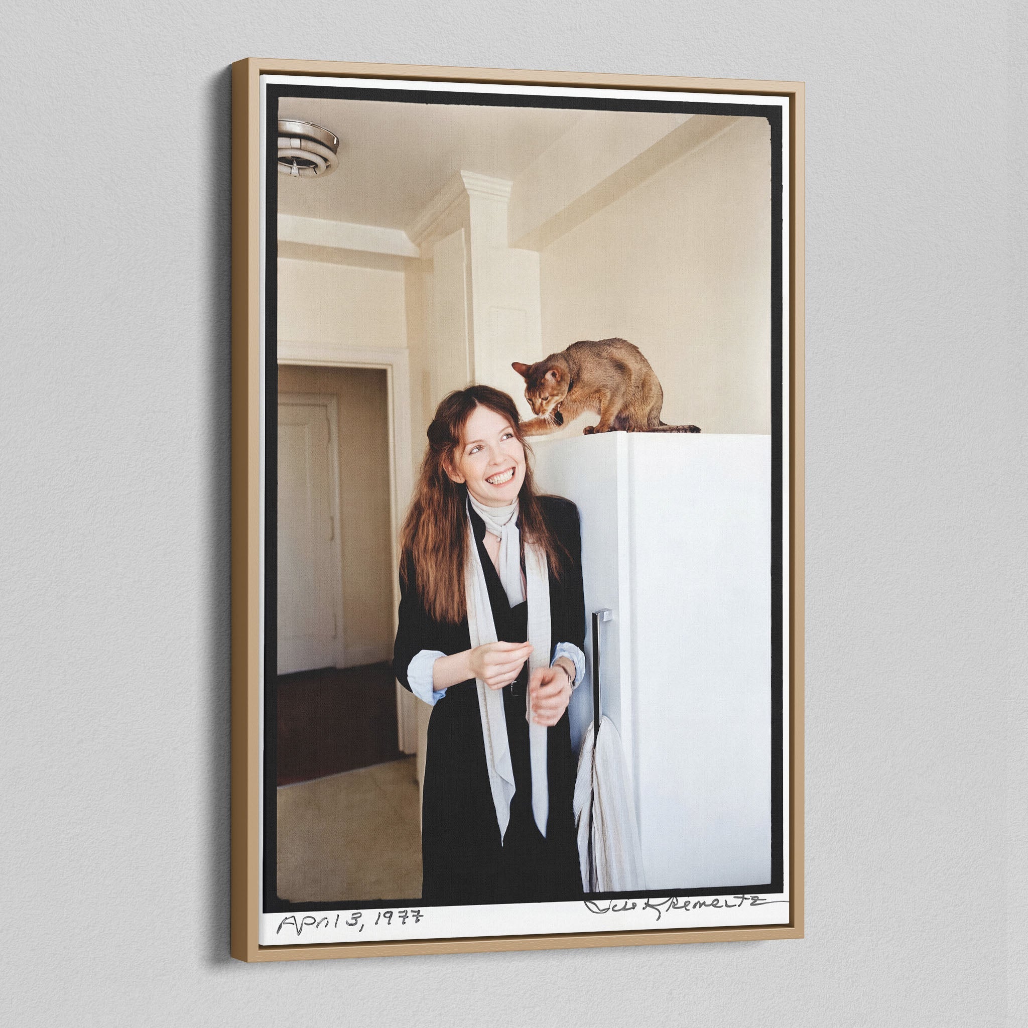 Angled view of the Diane Keaton colour canvas in a natural oak floating frame