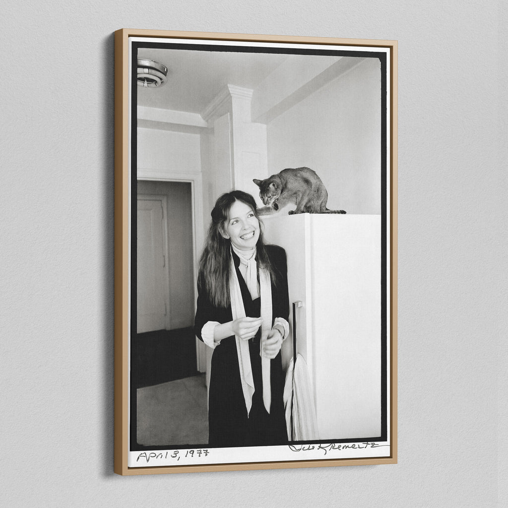 Angled view of the Diane Keaton black and white canvas in a natural oak floating frame