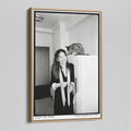 Angled view of the Diane Keaton black and white canvas in a natural oak floating frame
