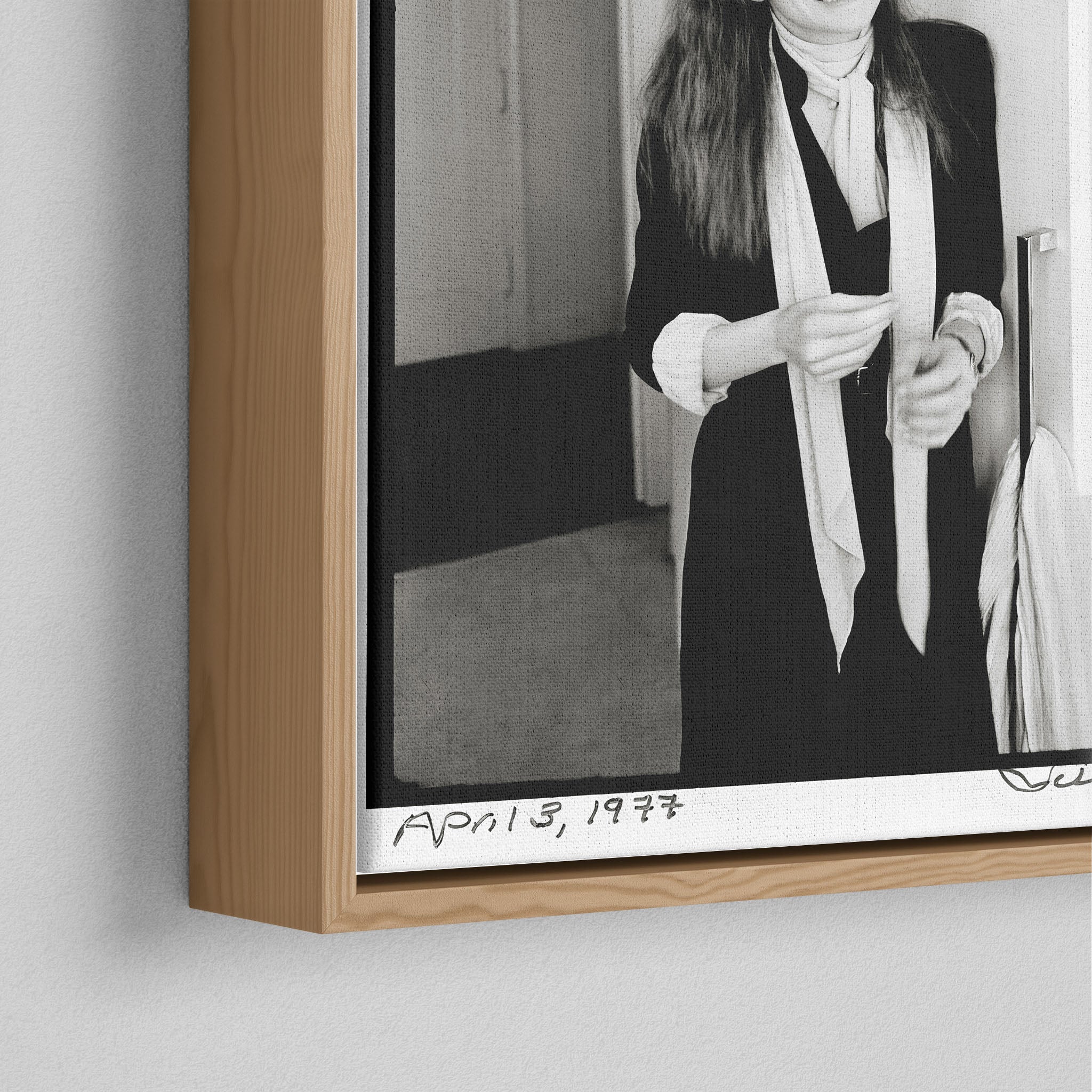 Corner close-up of the natural oak floating frame on the Diane Keaton canvas