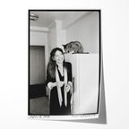 Unframed black and white print of Diane Keaton laughing with her Abyssinian cat in her 1977 San Remo apartment