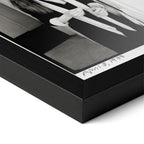 Close-up of the Diane Keaton black and white poster in a classic black wood frame