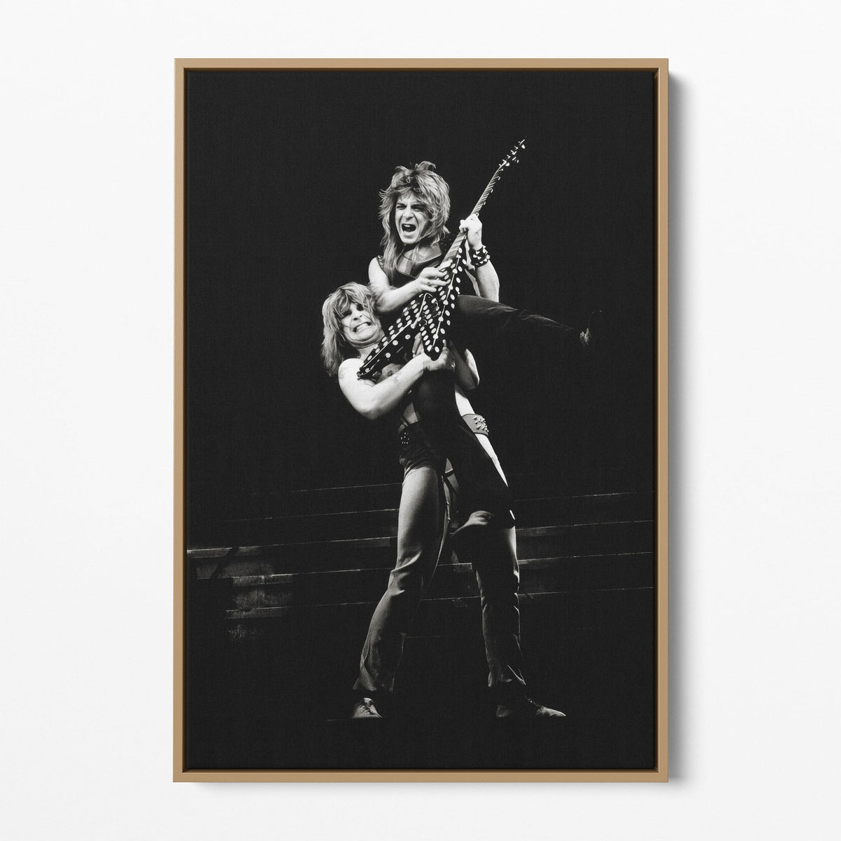 Front display of the Randy Rhoads black and white canvas in a natural oak floating frame